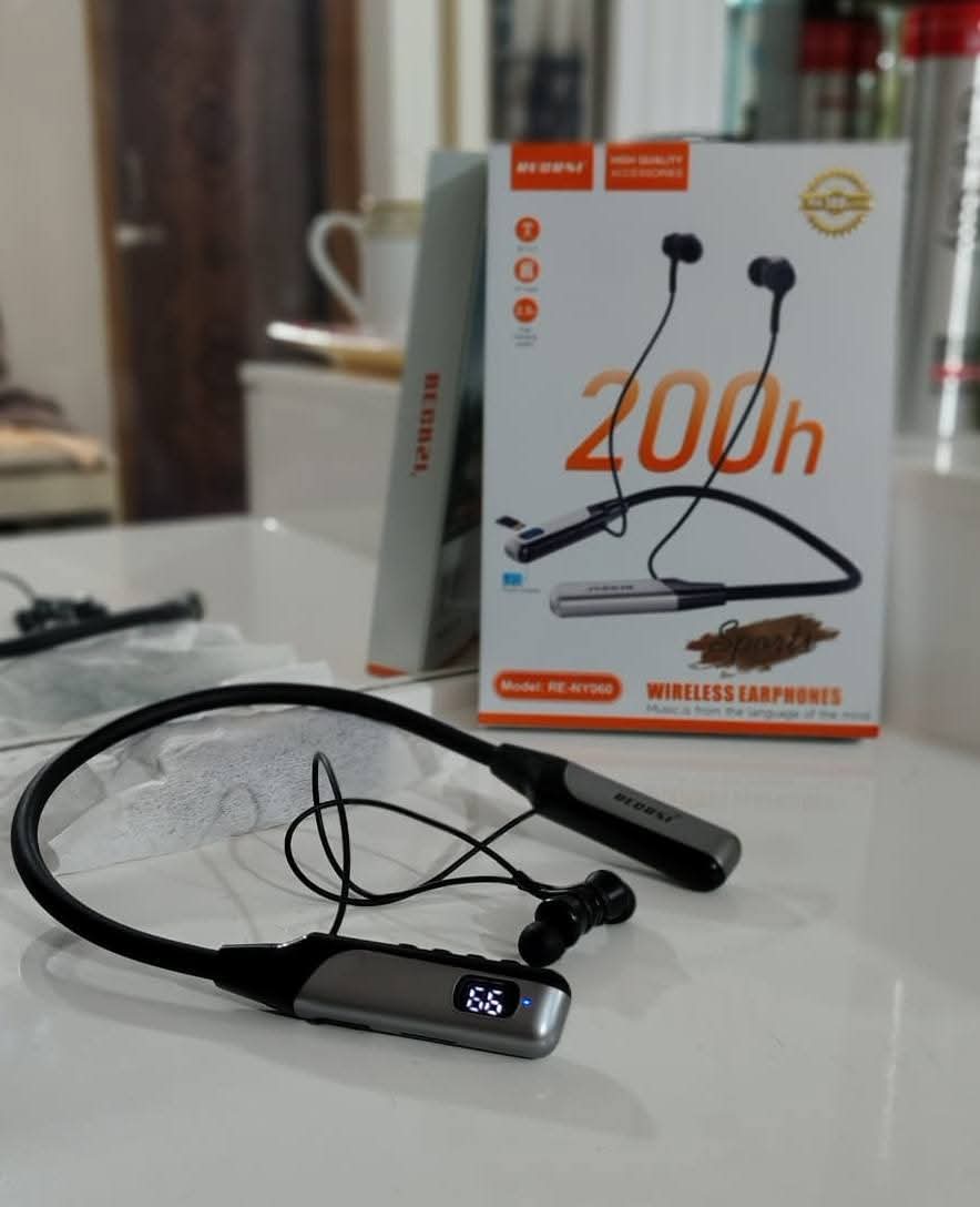 Orginal Regrsi wireless Neckband Bluetooth Earphone RE-NY060 Charging becup 200 Hours (Best price)